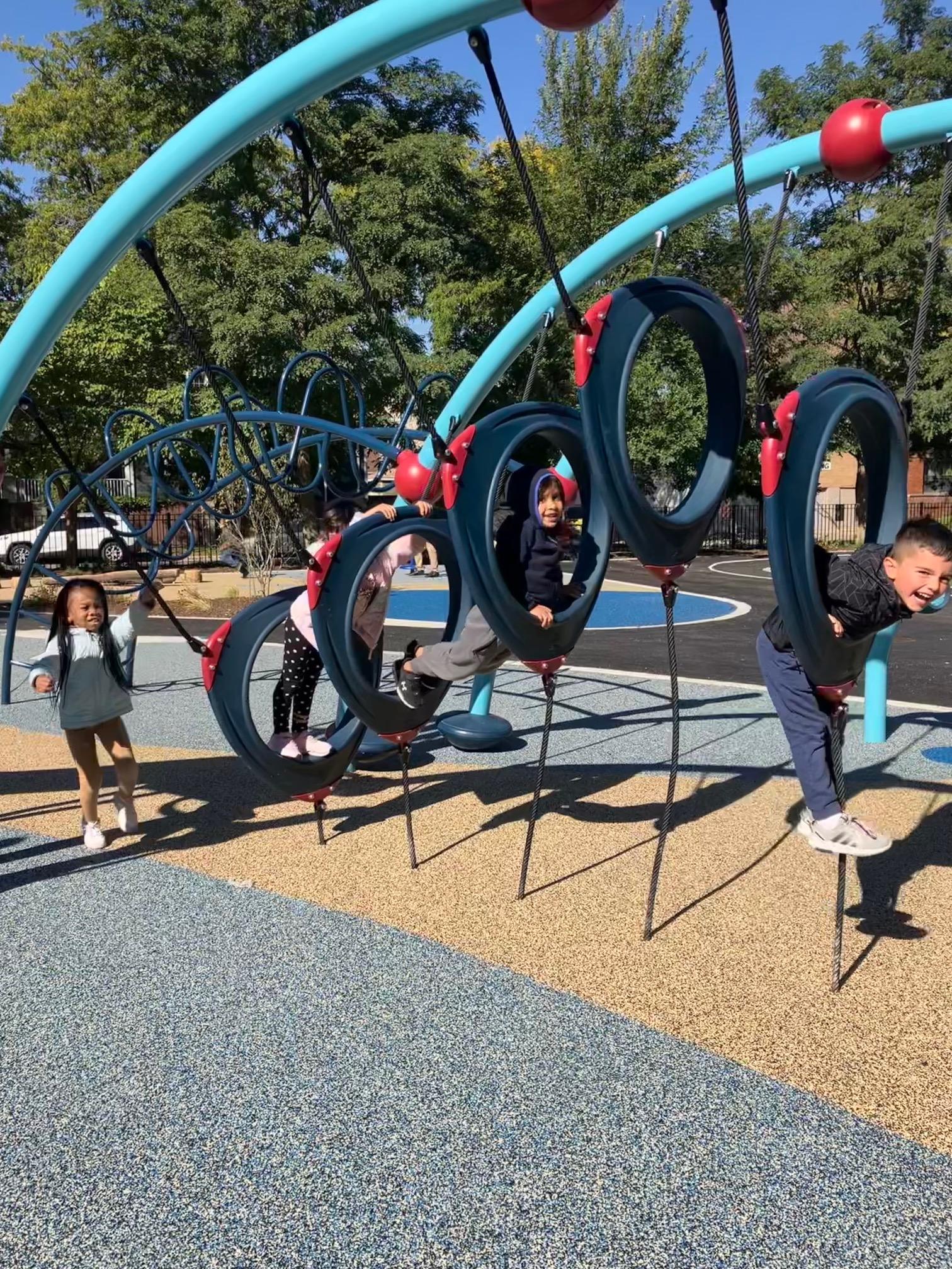 Kids playing at new playground